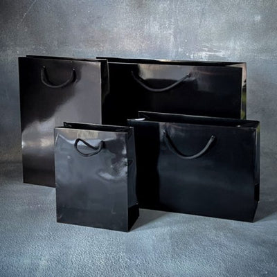 Wholesale FSC Black Gloss Laminated Rope Handle Paper Bags