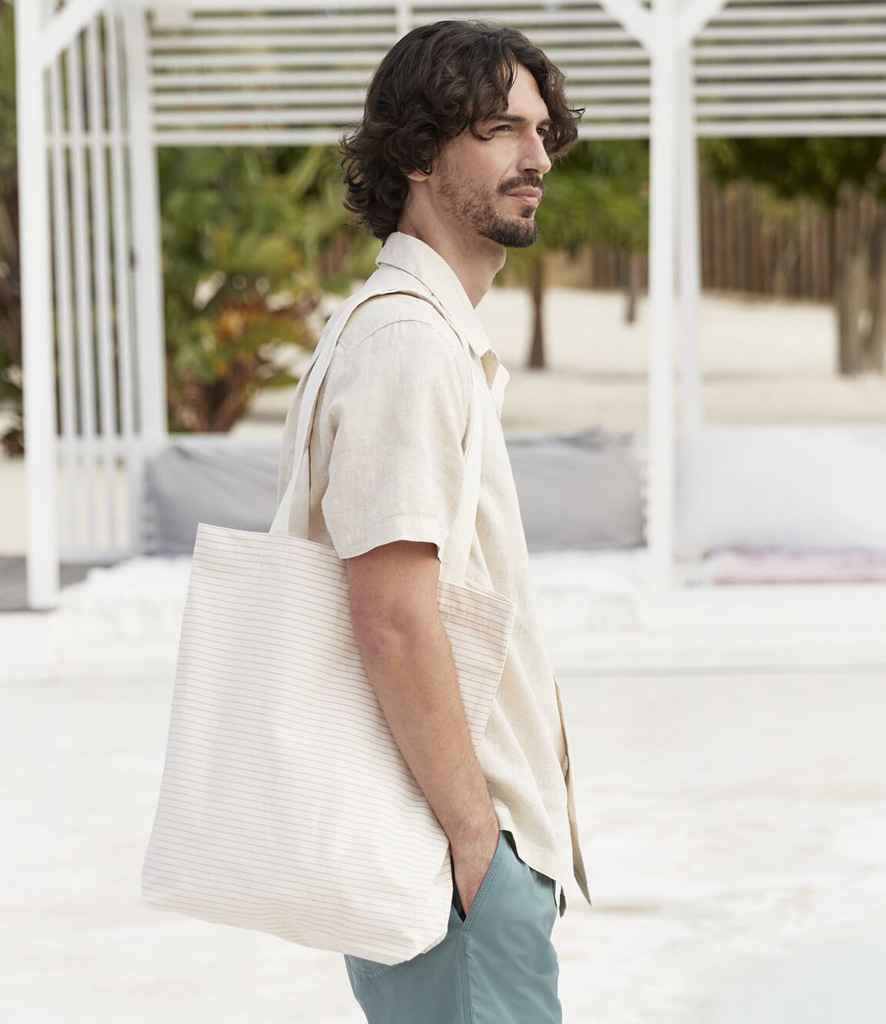 model holding Westford Mill Striped Organic Cotton Tote Bag
