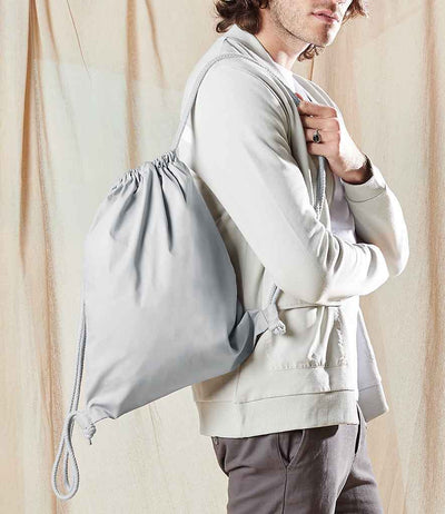 person carrying Westford Mill Organic Premium Cotton Gymsac light grey