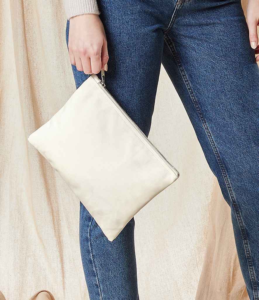 model holding Westford Mill Canvas Accessory Pouch