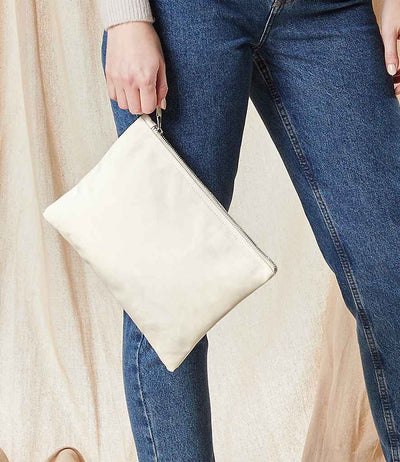 model holding Westford Mill Canvas Accessory Pouch