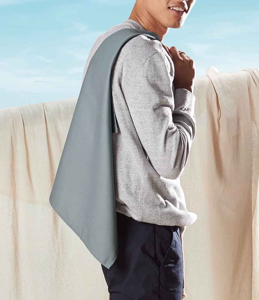 model holding grey Westford Mill Organic Cotton Tea Towel