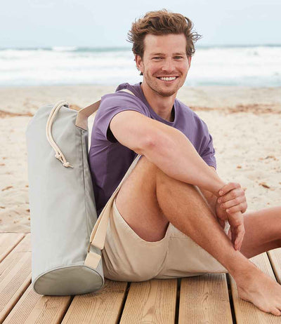 model holding Westford Mill EarthAware® Organic Yoga Mat Bag