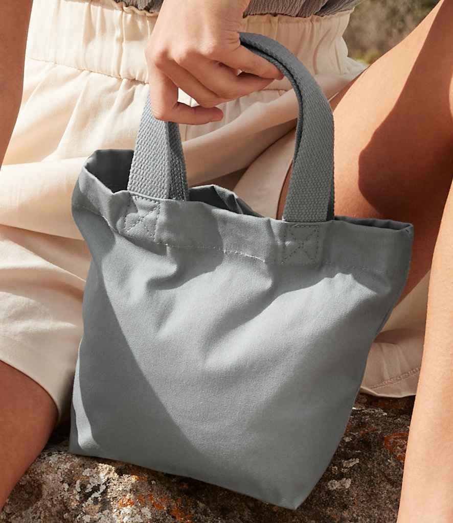model holding Westford Mill EarthAware® Organic Marina Mini Tote Bag