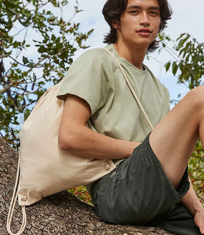 model holding Westford Mill Recycled Cotton Gymsac