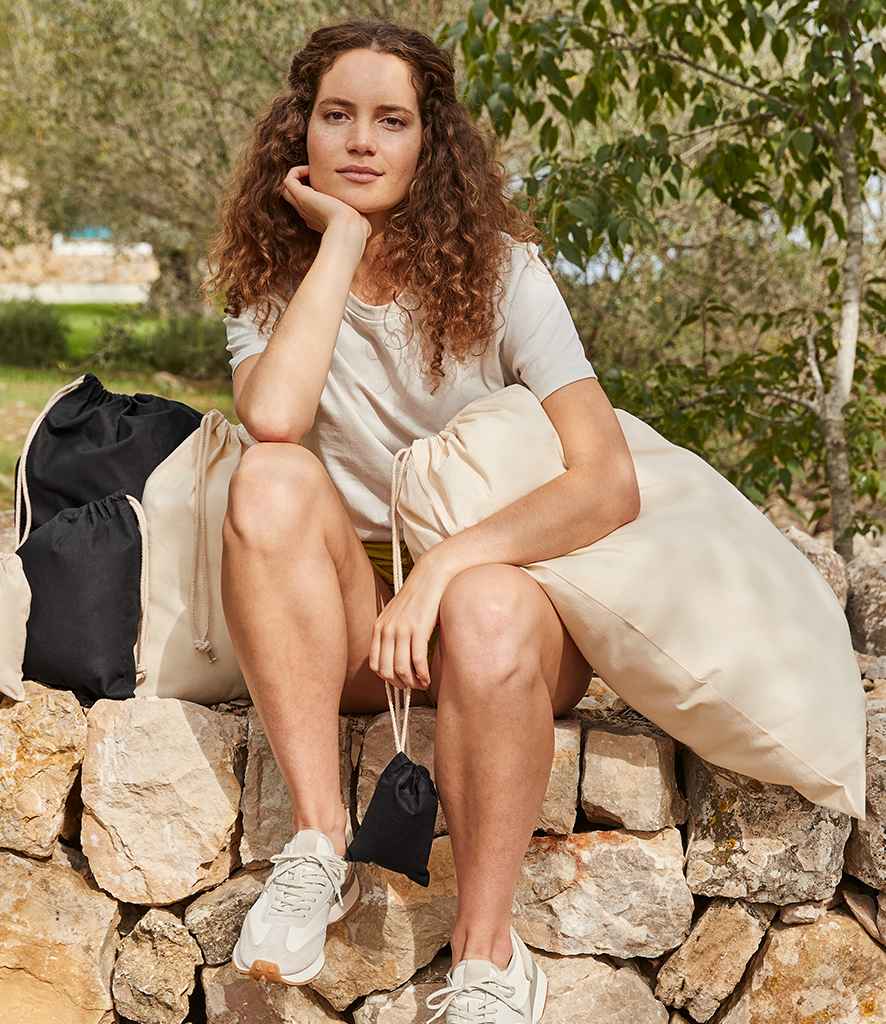 model posing with Westford Mill Recycled Cotton Stuff Bags