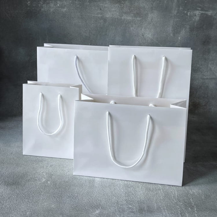 FSC® White Gloss Laminated Rope Handle Paper Bags Paper Bag Co